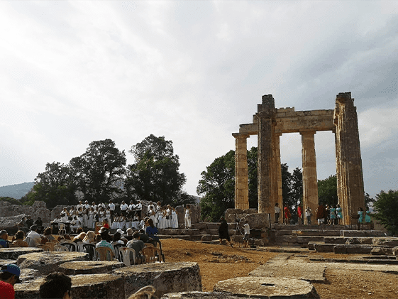 Ancient temple ruins with chorus singing event